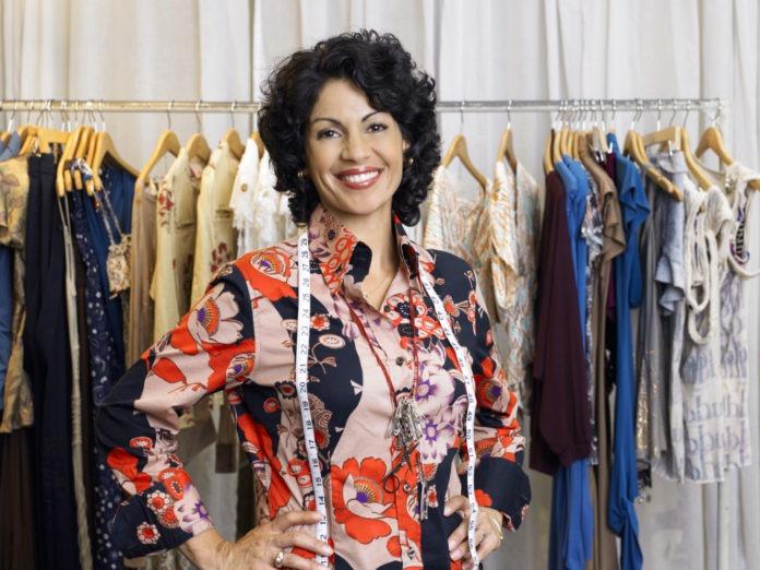Female fashion designer in boutique - Resources for women owned business